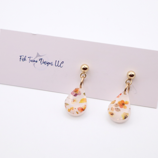 Floral teardrop earrings on a display card with 'Fish Towne Designs, LLC' branding.