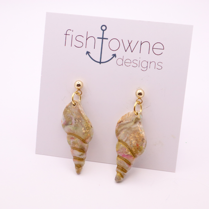 Handmade polymer clay seashell dangle earrings with gold ball studs on branded display card
