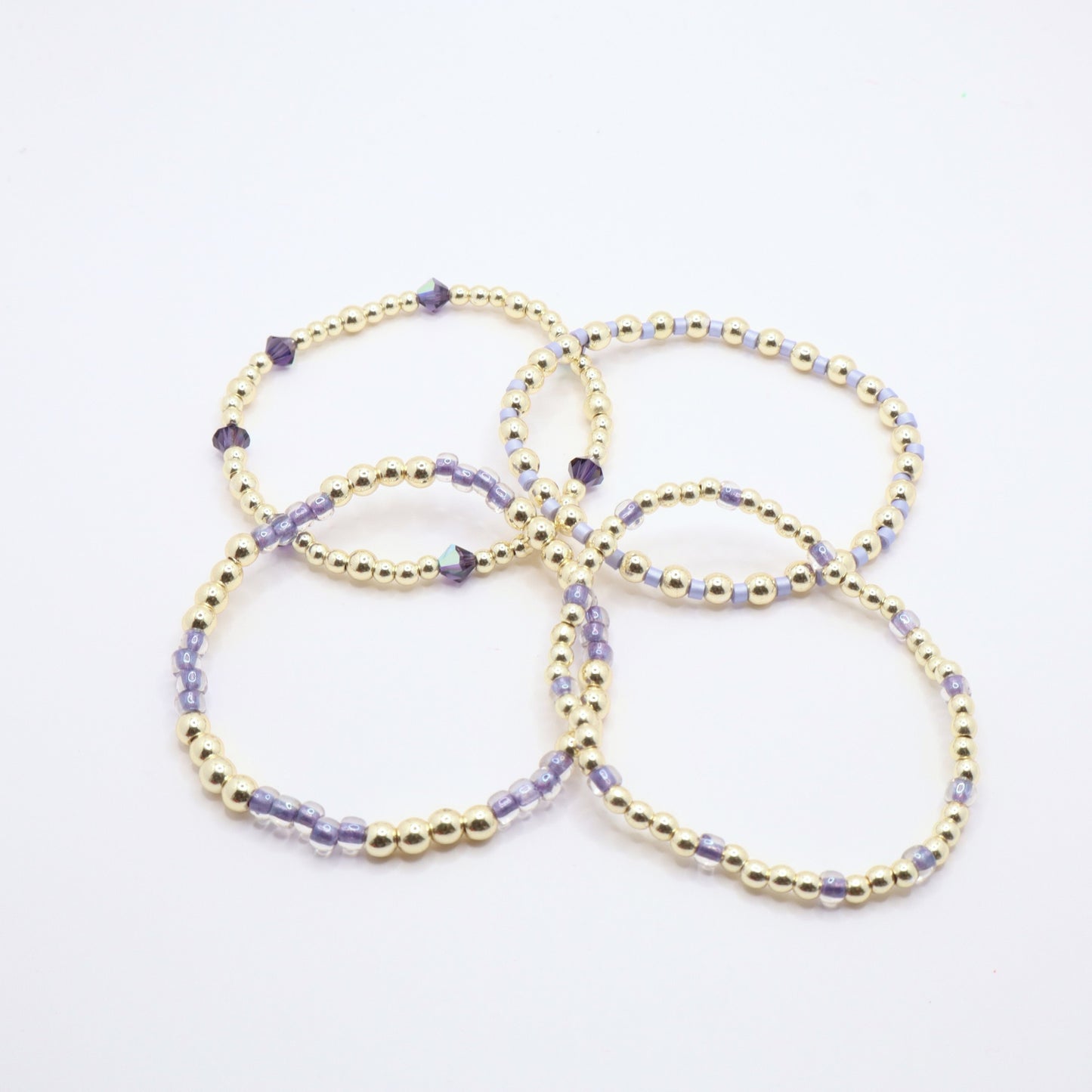 Handmade lavender and gold bracelet set perfect for everyday wear, gifting, and stacking.
