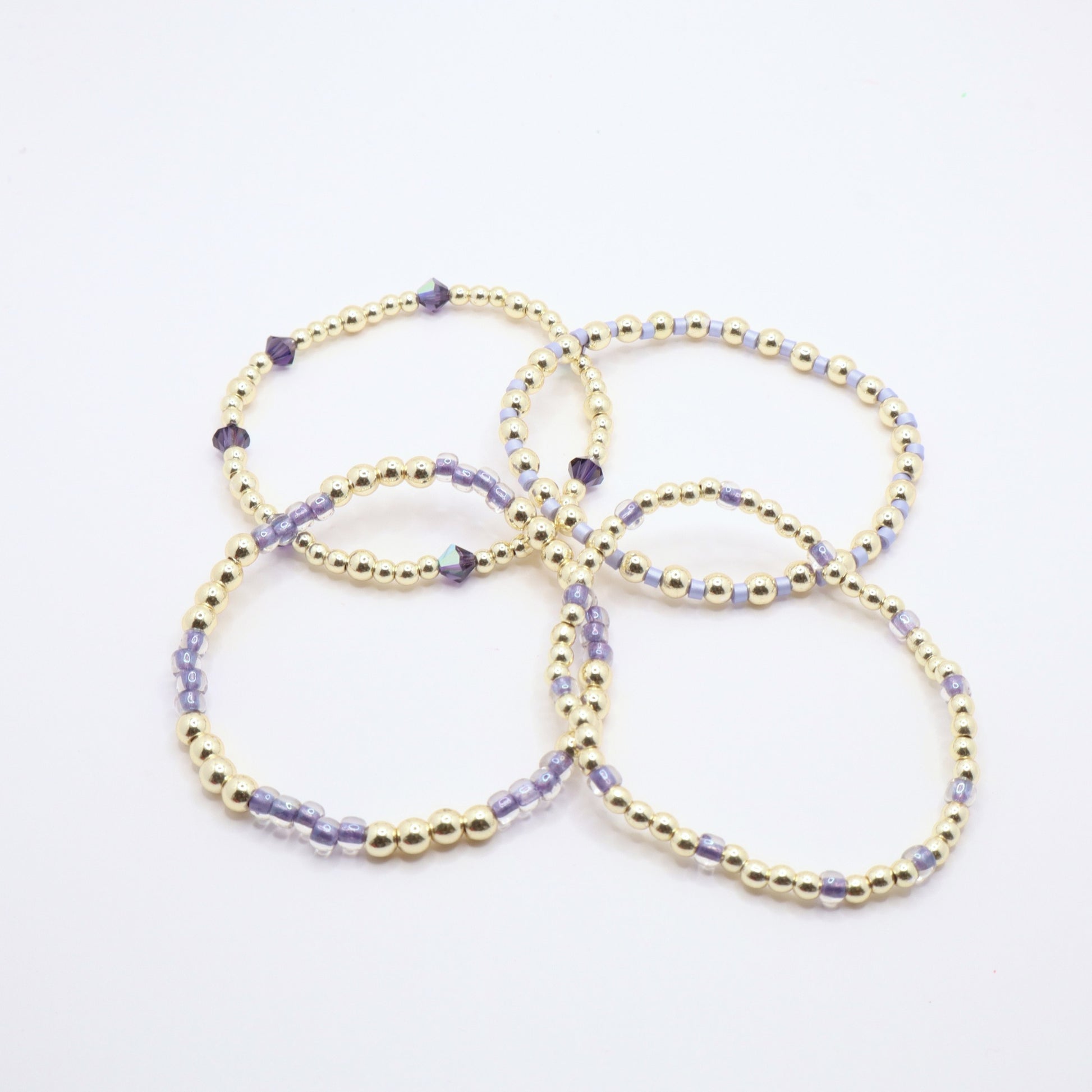 Handmade lavender and gold bracelet set perfect for everyday wear, gifting, and stacking.