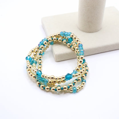 Handmade gold and blue bracelet set perfect for everyday wear.