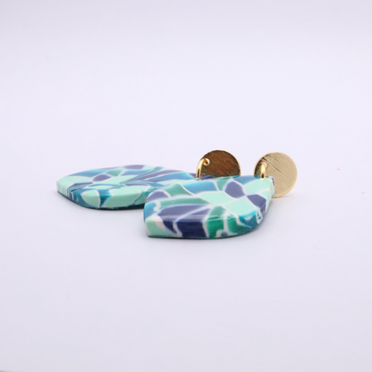 Side profile of lightweight teardrop earrings in blue and green mosaic pattern with 18k gold plated studs showing thickness and texture