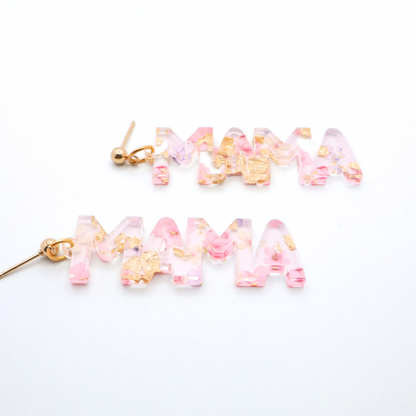 pink and gold floral 'MAMA' earrings on a white background