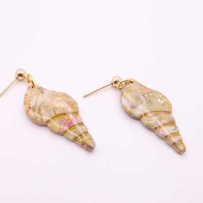 Ocean-inspired seashell dangle earrings with marbled pastel tones and gold leaf details