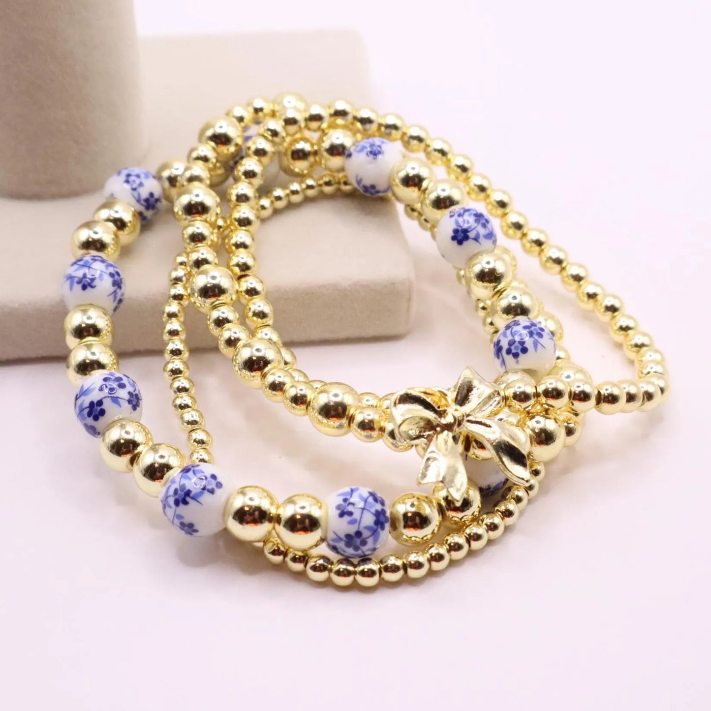 Gold and Chinoiserie Beaded Bracelet Stack with Bow Charm | Set of 4 Stretch Bracelets