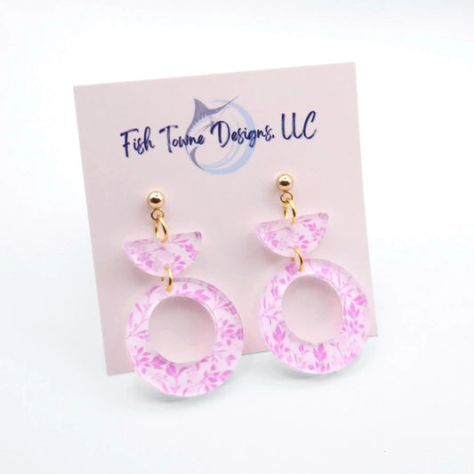 Pink floral earrings on a Fish Towne Designs card against a white background